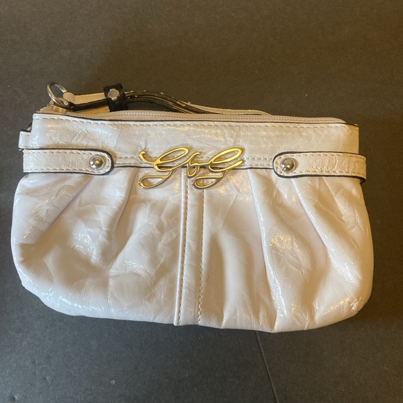 Bundle of three items. Two wristlets, and one eyeglass case. - Picture 4 of 10